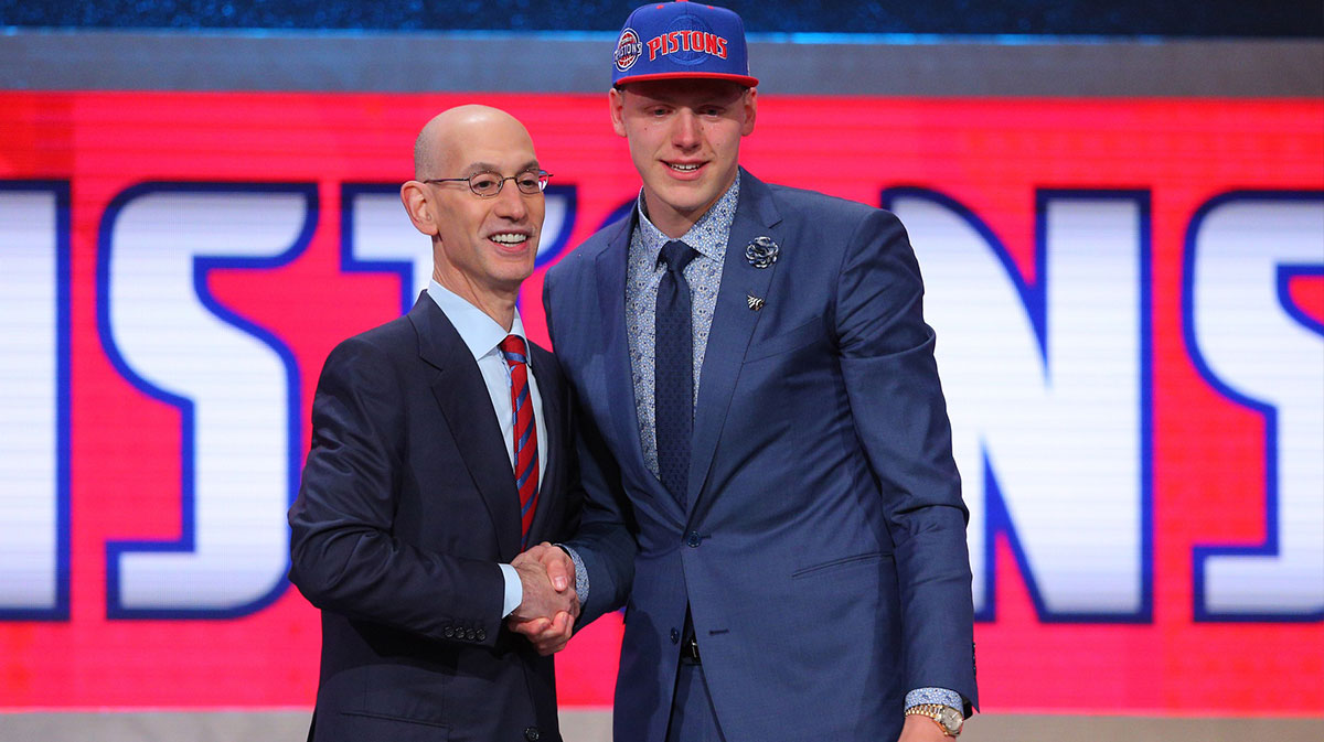 Henry Ellenson (Marquette) greets NBA commissioner Adam Silver after being selected as the number eighteen overall pick to the Detroit Pistons in the first round of the 2016 NBA Draft at Barclays Center.