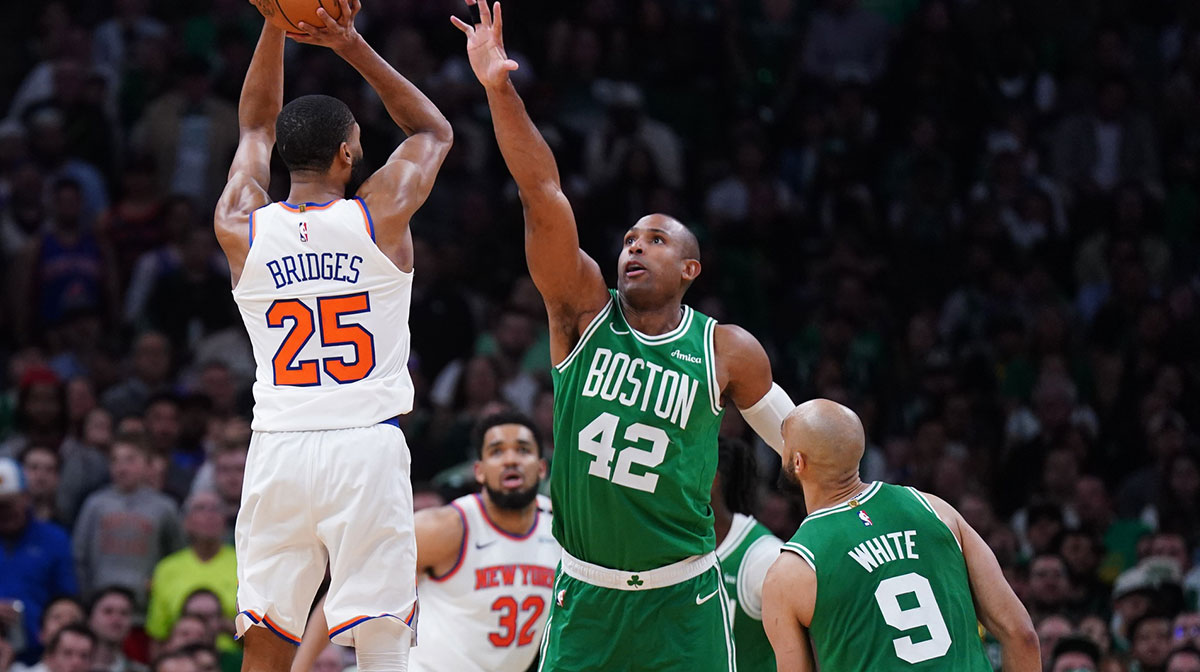 New York Knicks forward Mikal Bridges (25) shoots the ball against Boston Celtics center Al Horford (42) in the second half during game two of the second round for the 2025 NBA Playoffs at TD Garden.