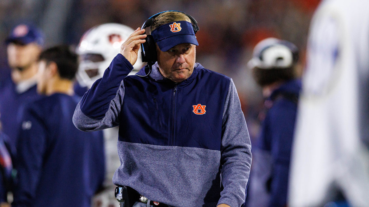 Auburn Tigers head coach Hugh Freeze walks onto the field during a timeout in the first quarter against the Kentucky Wildcats at Kroger Field.