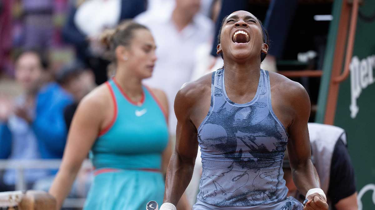 Coco Gauff of the United States poses with the trophy after winning the women’s singles final against Aryna Sabalenka on day 14 at Roland Garros Stadium.