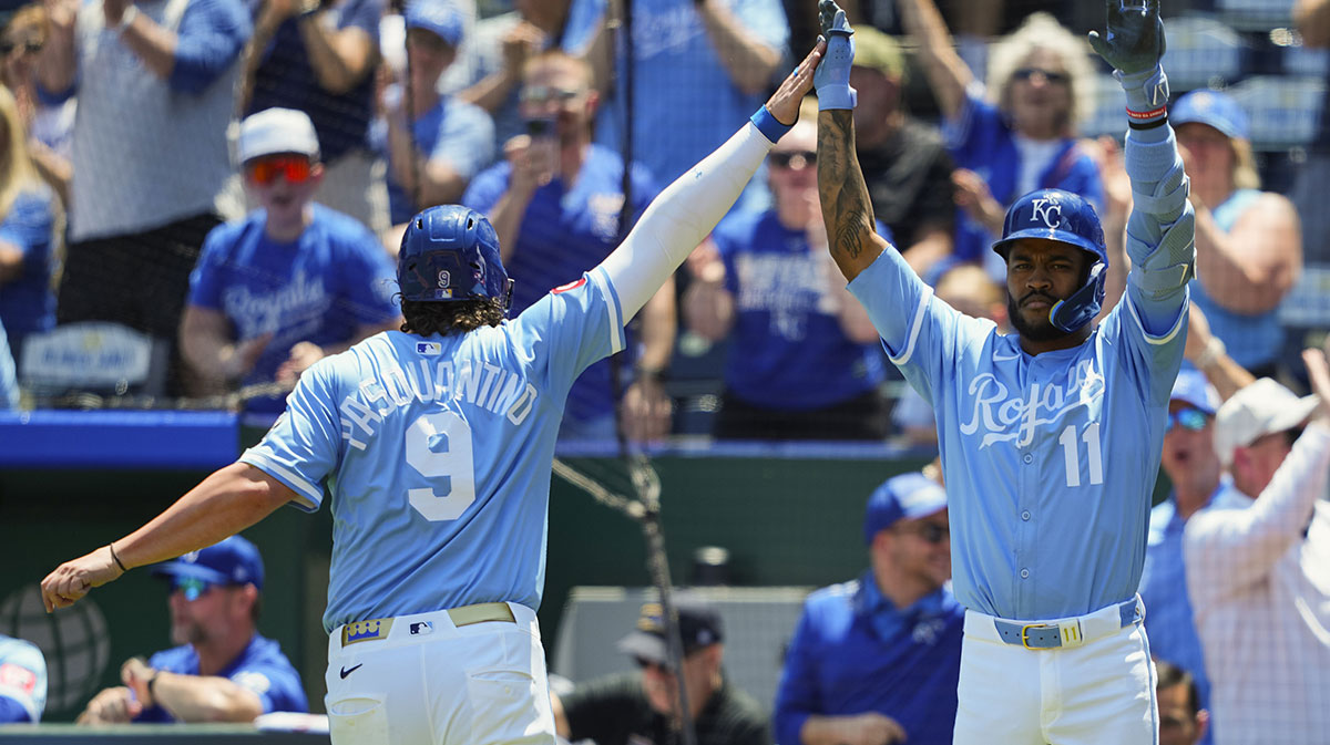 May 8, 2025; Kansas City, Missouri, USA; Kansas City Royals first baseman Vinnie Pasquantino (9) celebrates with third baseman Maikel Garcia (11) after scoring a run during the first inning against the Chicago White Sox at Kauffman Stadium. Mandatory Credit: Jay Biggerstaff-Imagn Images