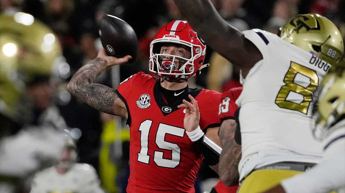 Georgia quarterback Carson Beck (15) throws the ball during the first half of a NCAA college football game against Georgia Tech in Athens, Ga., on Friday, Nov. 29, 2024.
