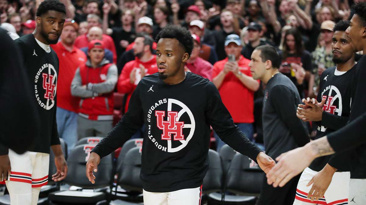 Houston Cougars guard LJ Cryer (4) during team introductions before the game against the Texas Tech Red Raiders at United Supermarkets Arena.