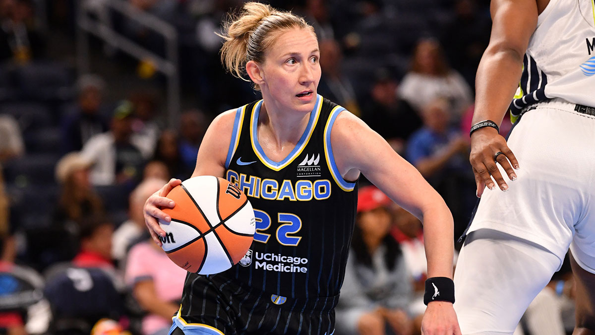 Chicago Sky guard Courtney Vandersloot (22) controls the ball during the second half against the Dallas Wings at the Wintrust Arena.
