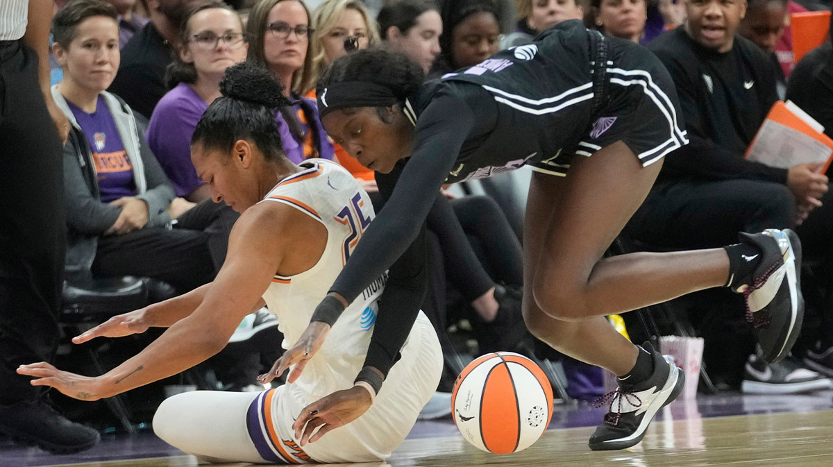 Phoenix Mercury forward Alyssa Thomas (25) and Golden State Valkyries forward Laeticia Amihere (3) battle for a loose ball during pre-season action at PHX Arena May 11, 2025.