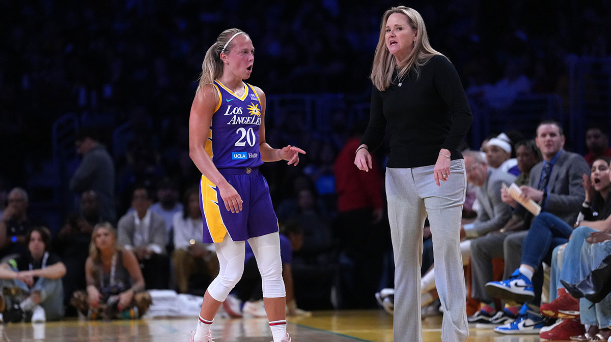 A; LA Sparks coach Lynne Roberts (right) talks with guard Julie Allemand (20) in the second half against the Golden State Valkyries at Crypto.com Arena.