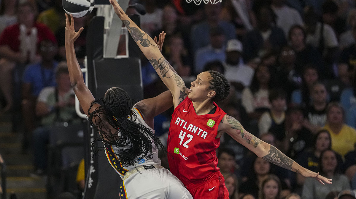Indiana Fever forward Aliyah Boston (7) is defended at the basket by Atlanta Dream center Brittney Griner (42) at Gateway Center Arena at College Park.