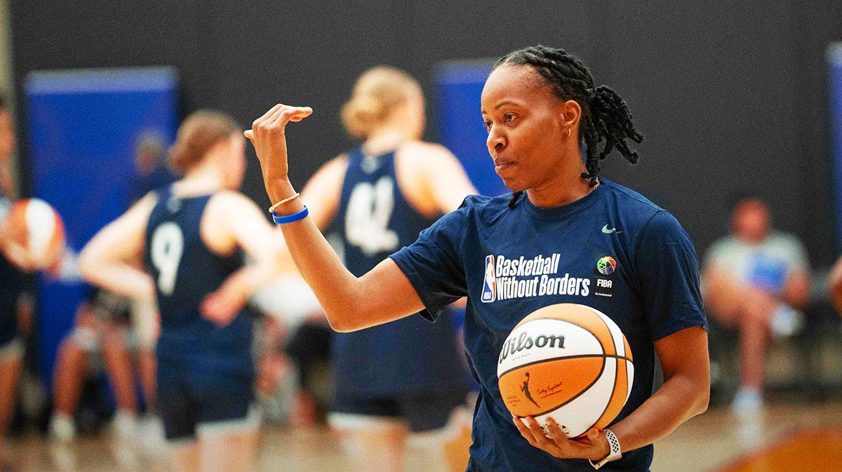 Shey Peddy coaches a group of girls during the Basketball Without Borders Global girls camp at Verizon 5G Performance Center in Phoenix on July 20, 2024.