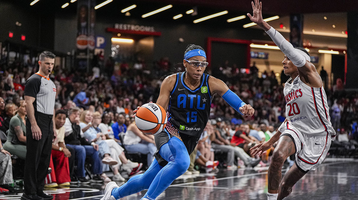 Atlanta Dream guard Allisha Gray (15) dribbles against Washington Mystics guard Brittney Sykes (20) during the second half at Gateway Center Arena at College Park.
