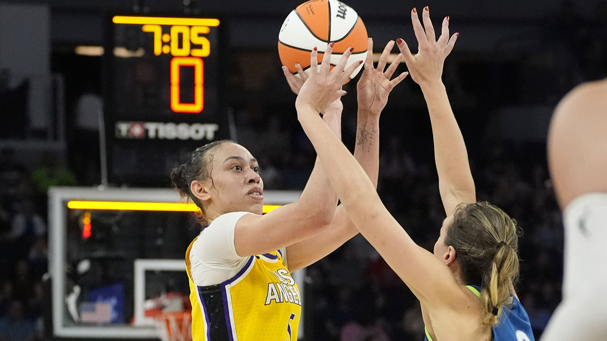 Los Angeles Sparks forward Dearica Hamby (5) shoots against Minnesota Lynx forward Alanna Smith (8) in the second quarter at Target Center.