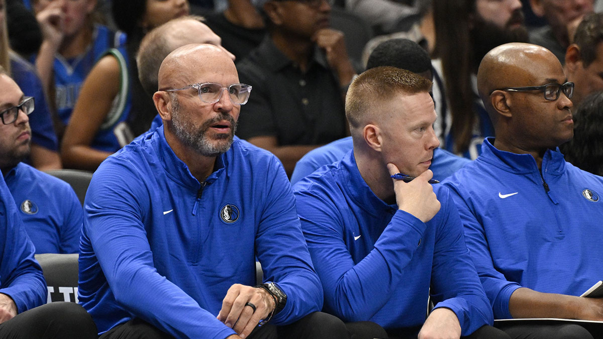 Dallas Mavericks head coach Jason Kidd (left) and assistant coach Sean Sweeney (right) during the game between the Dallas Mavericks and the San Antonio Spurs at the American Airlines Center.