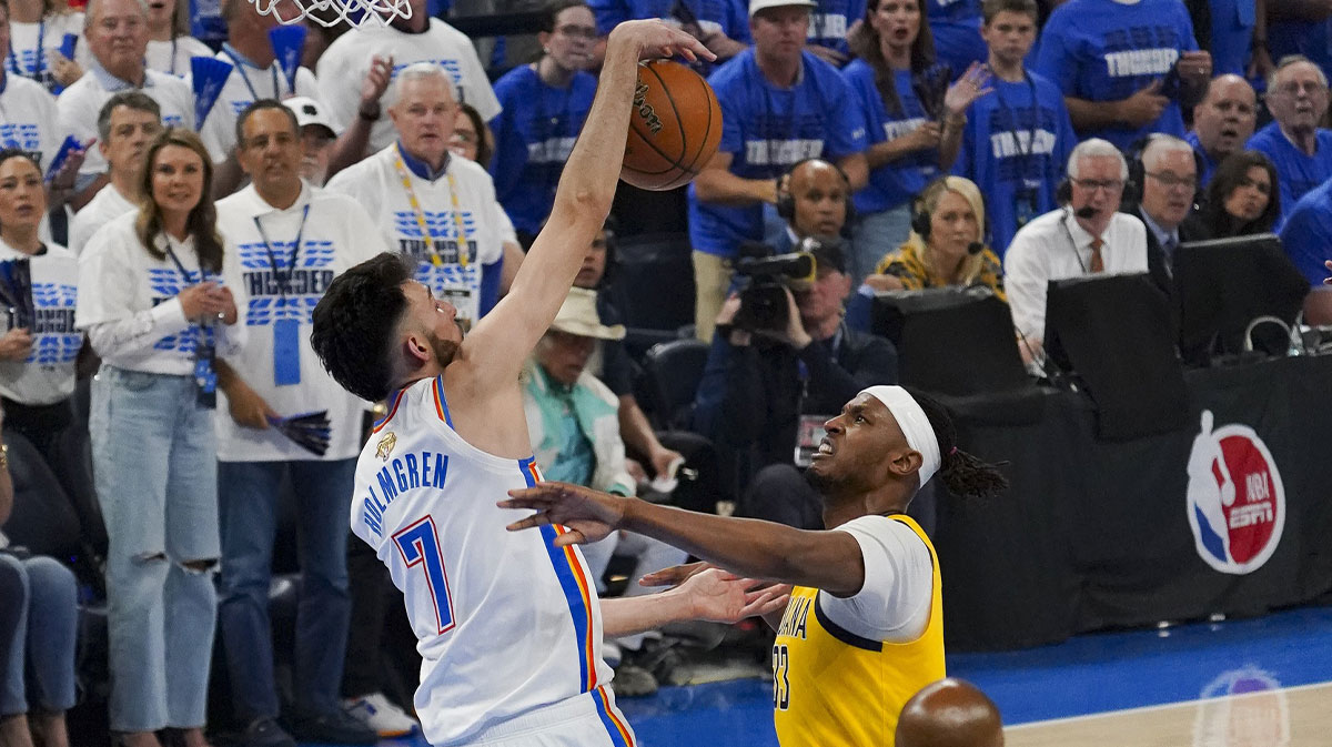 Oklahoma City Thunder forward Chet Holmgren (7) blocks a shot by Indiana Pacers center Myles Turner (33) during the second quarter in game five of the 2025 NBA Finals at Paycom Center.