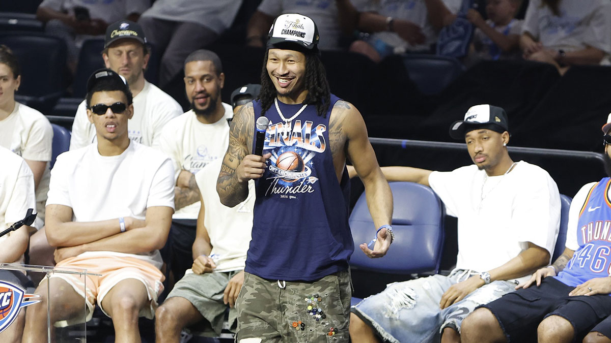 Oklahoma City Thunder forward Jaylin Williams (6) speaks to fans during the Champions Opening Ceremony for the parade inside the Paycom Center.