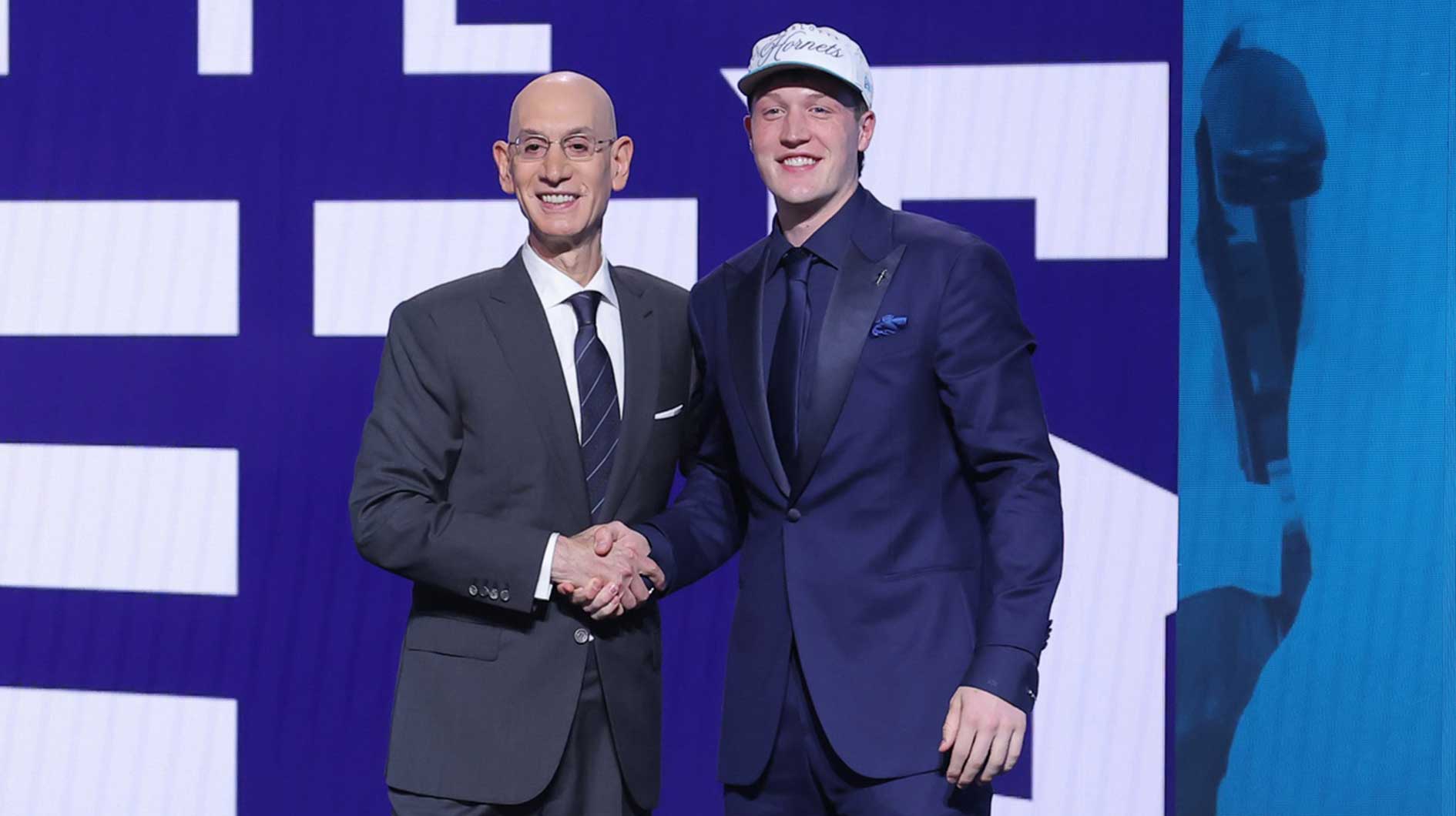 ; Kon Knueppel stands with NBA commissioner Adam Silver after being selected as the fourth pick by the Charlotte Hornets in the first round of the 2025 NBA Draft at Barclays Center.