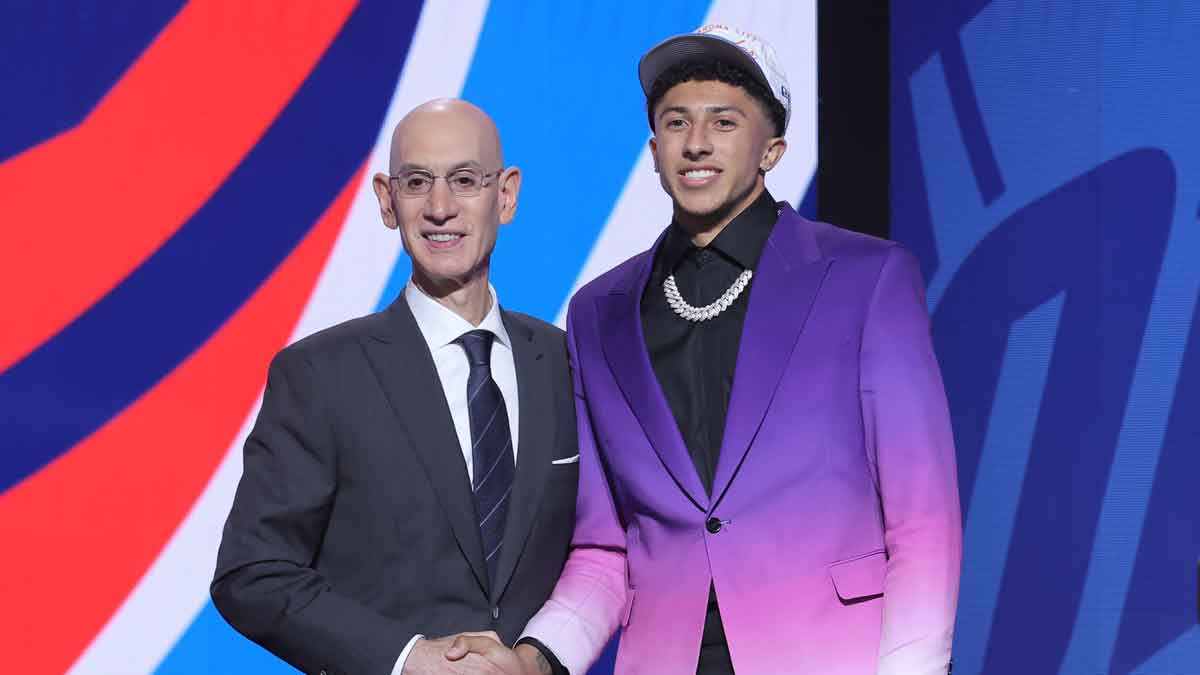 Nique Clifford stands with NBA commissioner Adam Silver after being selected as the 24th pick by the Oklahoma City Thunder in the first round of the 2025 NBA Draft at Barclays Center.