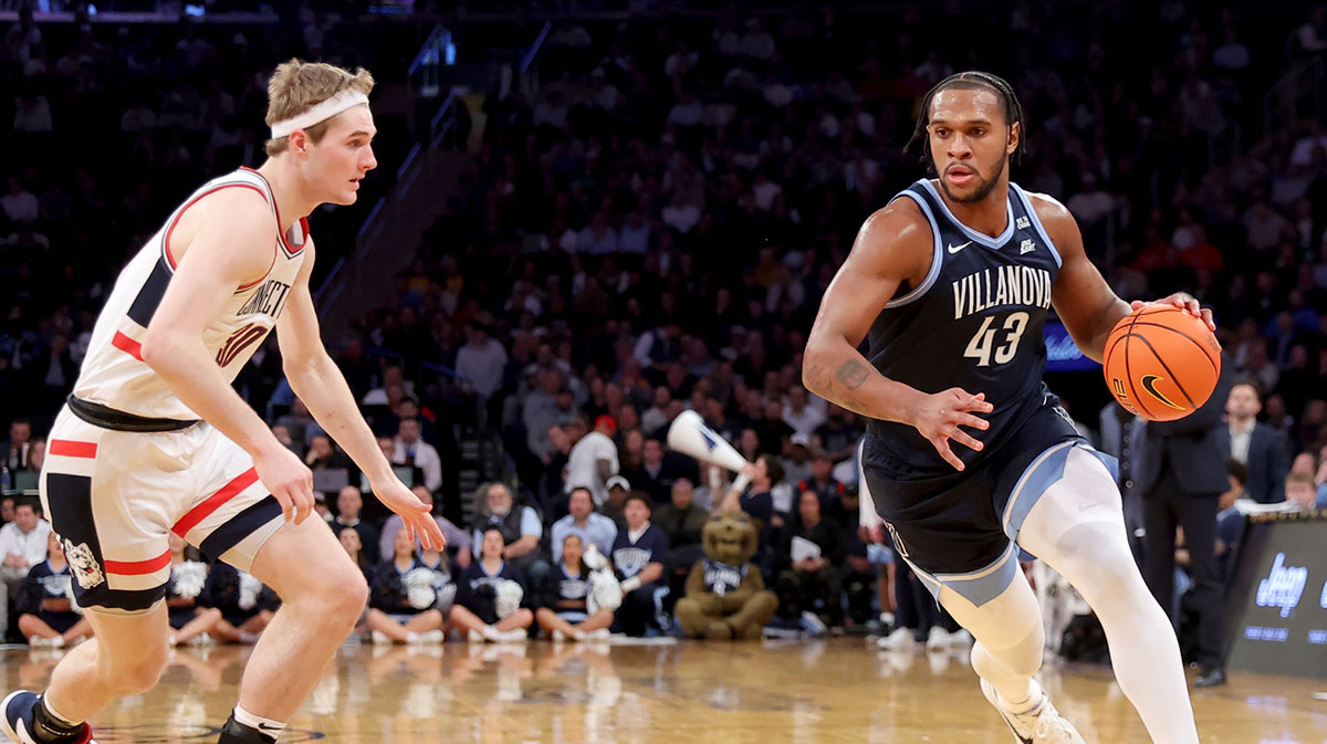 A; Villanova Wildcats forward Eric Dixon (43) drives to the basket against Connecticut Huskies forward Liam McNeeley (30) during the first half at Madison Square Garden.