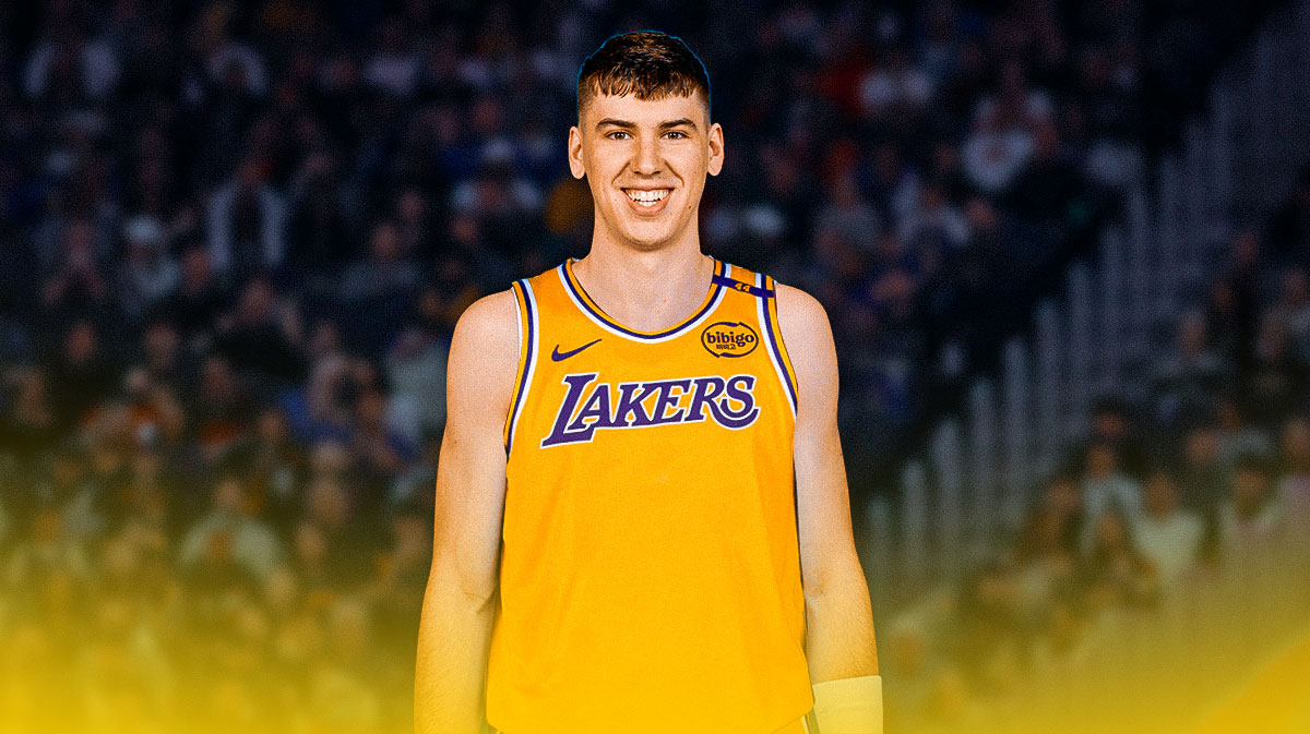 NBA player Jake LaRavia in a LA Lakers jersey with the LA Lakers arena in the background, free agency