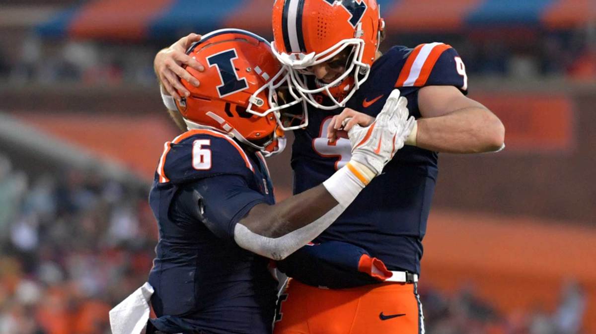 Illinois Fighting Illini quarterback Luke Altmyer (9) and running back Josh McCray (6) celebrate McCray’s touchdown during the second half at Memorial Stadium.