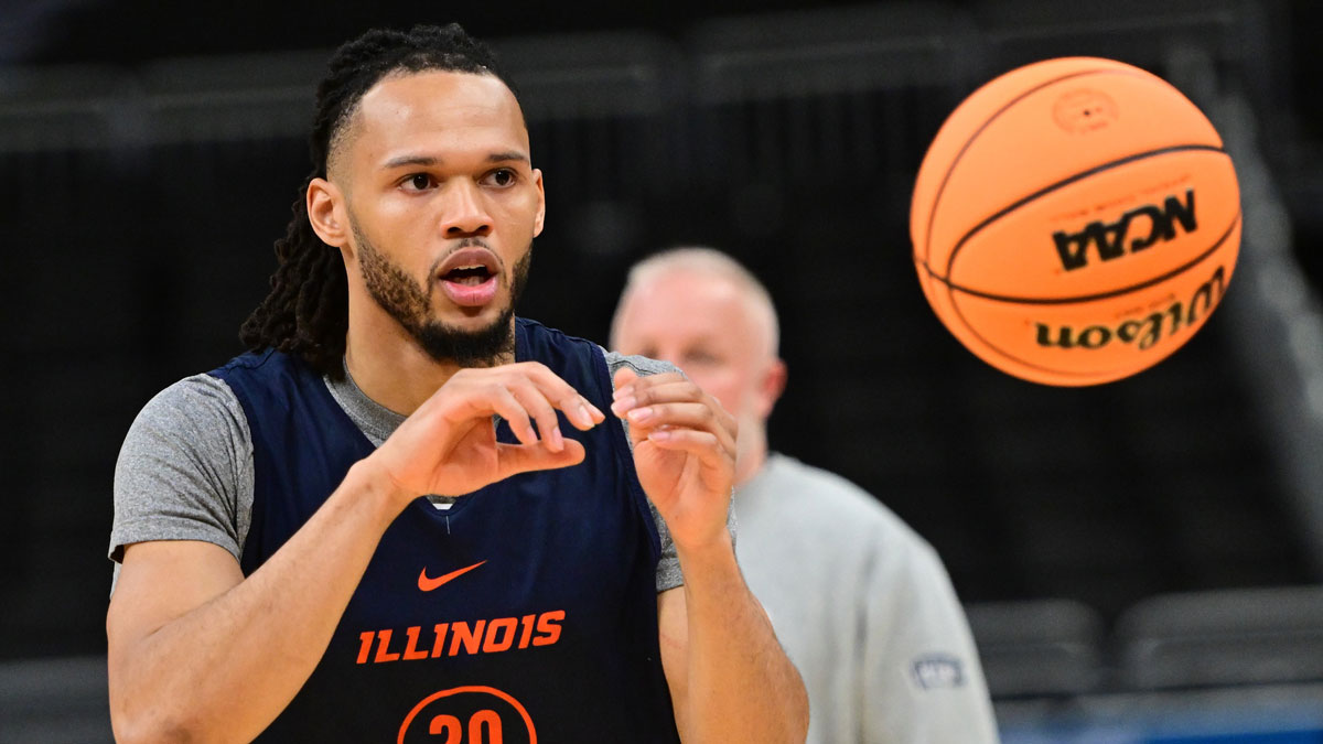 Illinois Fighting Illini guard Ty Rodgers (20) works out during NCAA Tournament First Round Practice at Fiserv Forum.