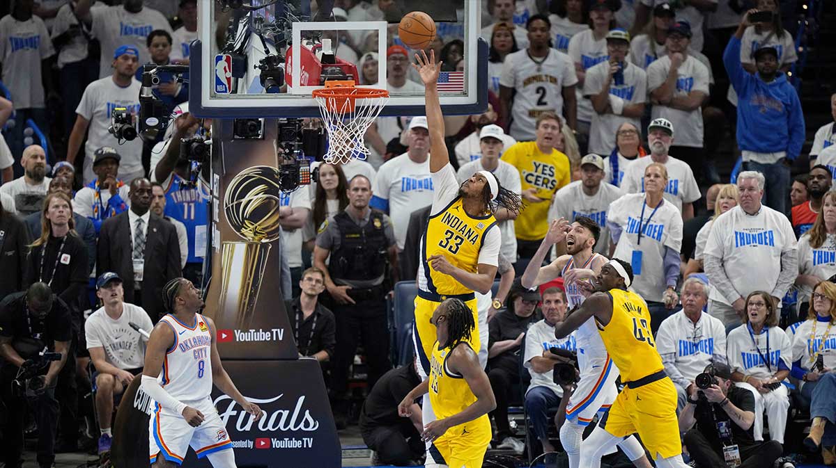 Jun 5, 2025; Oklahoma City, Oklahoma, USA; Indiana Pacers center Myles Turner (33) reaches for the ball against the Oklahoma City Thunder during the fourth quarter in game one of the 2025 NBA Finals at Paycom Center. Mandatory Credit: Kyle Terada-Imagn Images