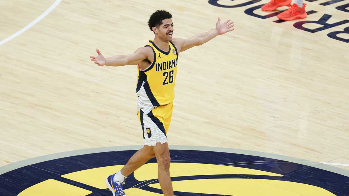 Indiana Pacers guard Ben Sheppard (26) celebrates hitting a shot against the Oklahoma City Thunder as time expires in the third quarter during game six of the 2025 NBA Finals at Gainbridge Fieldhouse.