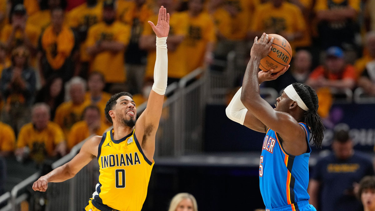 Indiana Pacers guard Tyrese Haliburton (0) defends against a shot by Oklahoma City Thunder guard Luguentz Dort (5) in the third quarter during game six of the 2025 NBA Finals at Gainbridge Fieldhouse.