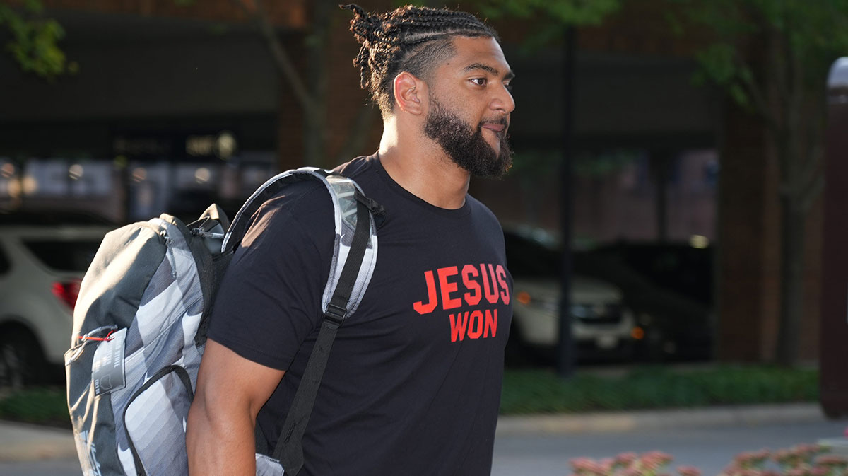 Aug 5, 2024; Columbus, OH, USA; Ohio State University football player J.T. Tuimoloau walks from the parking garage to the team hotel where they will stay during most of the 2024 Fall Camp.
