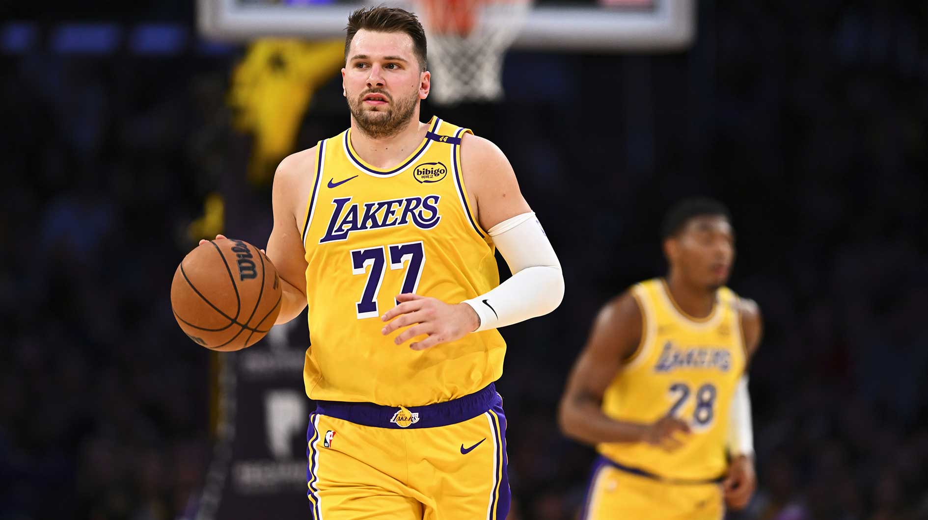 Los Angeles Lakers guard Luka Doncic (77) moves the ball against the Houston Rockets during the first half at Crypto.com Arena.