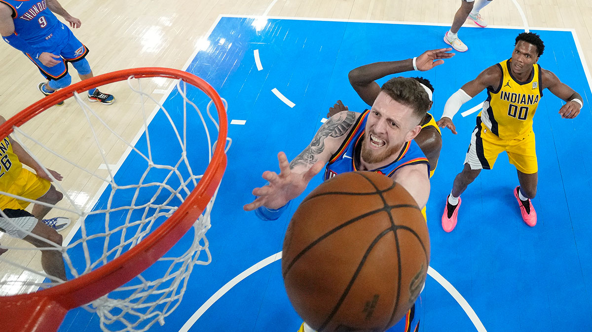 Oklahoma City Thunder center Isaiah Hartenstein (55) drives to the basket against Indiana Pacers forward Pascal Siakam (43) during the first half of game seven of the 2025 NBA Finals at Paycom Center.