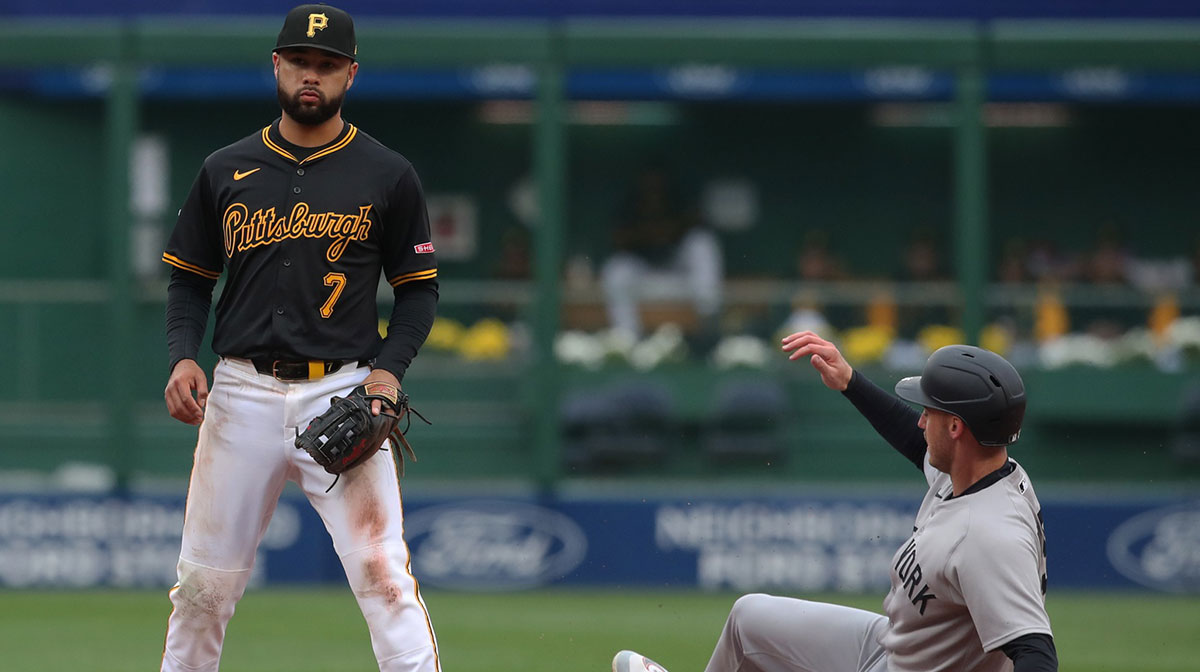 New York Yankees right fielder Cody Bellinger (35) steals second base as Pittsburgh Pirates shortstop Isiah Kiner-Falefa (7) looks for a throw during the first inning at PNC Park.