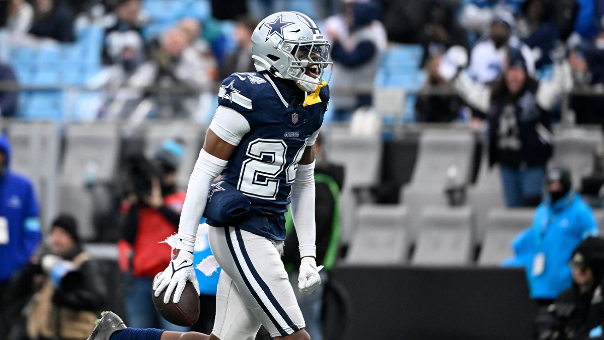Dec 15, 2024; Charlotte, North Carolina, USA; Dallas Cowboys safety Israel Mukuamu (24) reacts after intercepting the ball in the fourth quarter at Bank of America Stadium. Mandatory Credit: Bob Donnan-Imagn Images