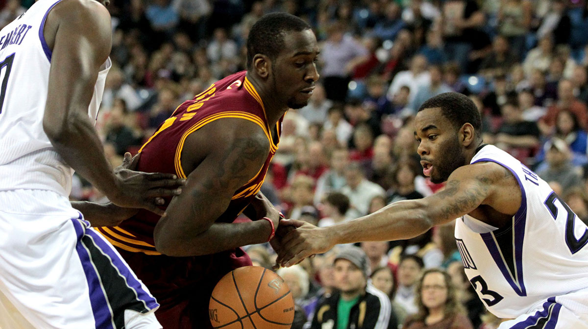 Cleveland Cavaliers center J.J. Hickson (21) has the ball knocked out of his hands by Sacramento Kings guard Marcus Thornton (23) in the first quarter at the Power Balance Pavilion.