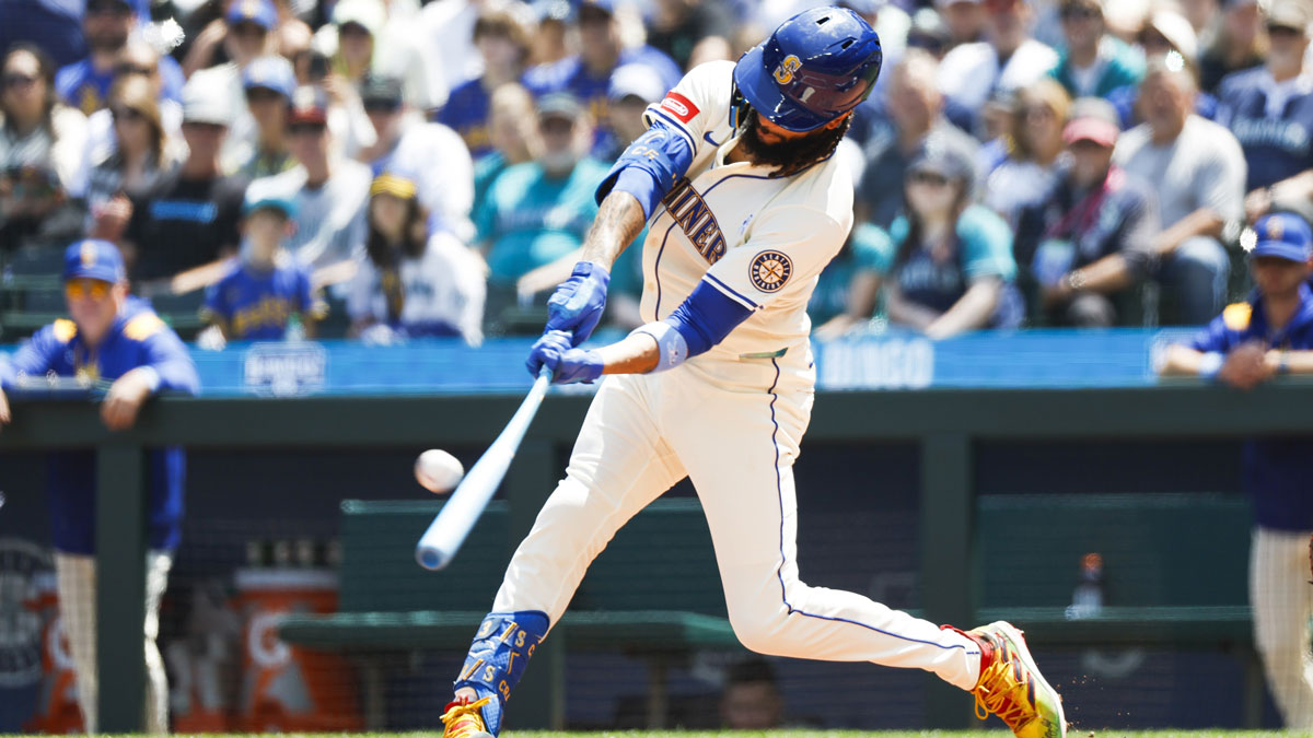 Seattle Mariners shortstop J.P. Crawford (3) hits a grand-slam home run Cleveland Guardians during the second inning at T-Mobile Park.