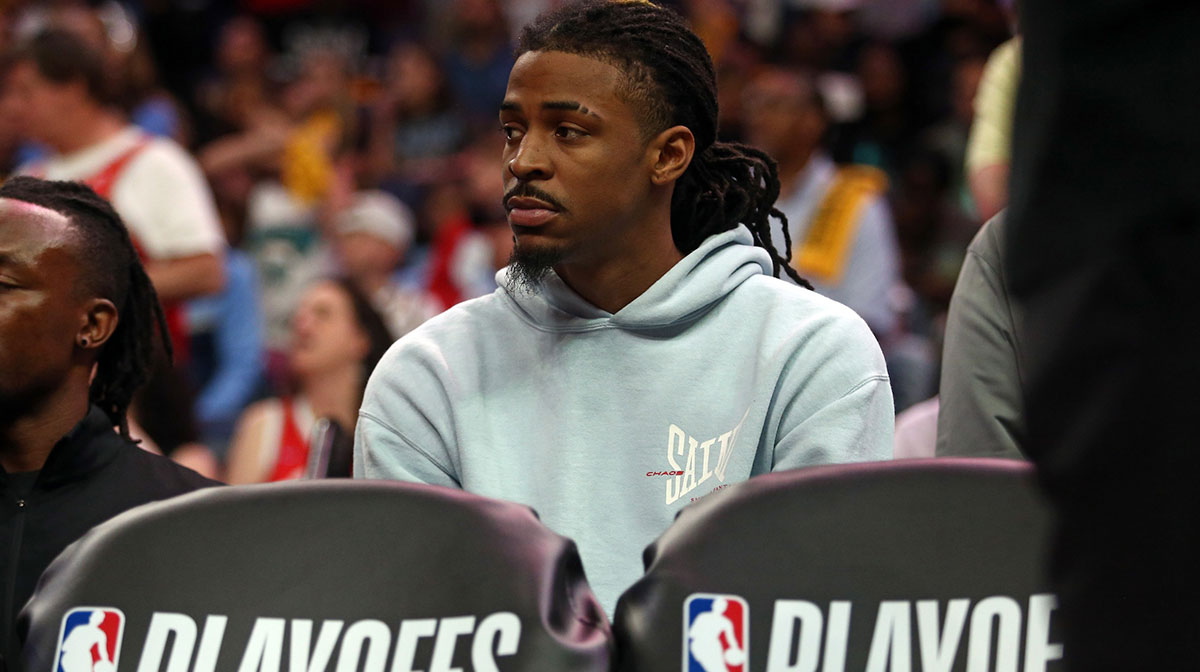 Memphis Grizzlies guard Ja Morant (12) looks on from the bench area during the fourth quarter against the Oklahoma City Thunder during game four for the first round of the 2024 NBA Playoffs at FedExForum.