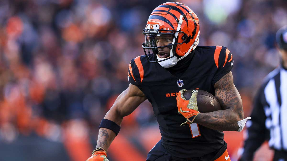Dec 22, 2024; Cincinnati, Ohio, USA; Cincinnati Bengals wide receiver Ja'Marr Chase (1) runs with the ball against the Cleveland Browns in the second half at Paycor Stadium.
