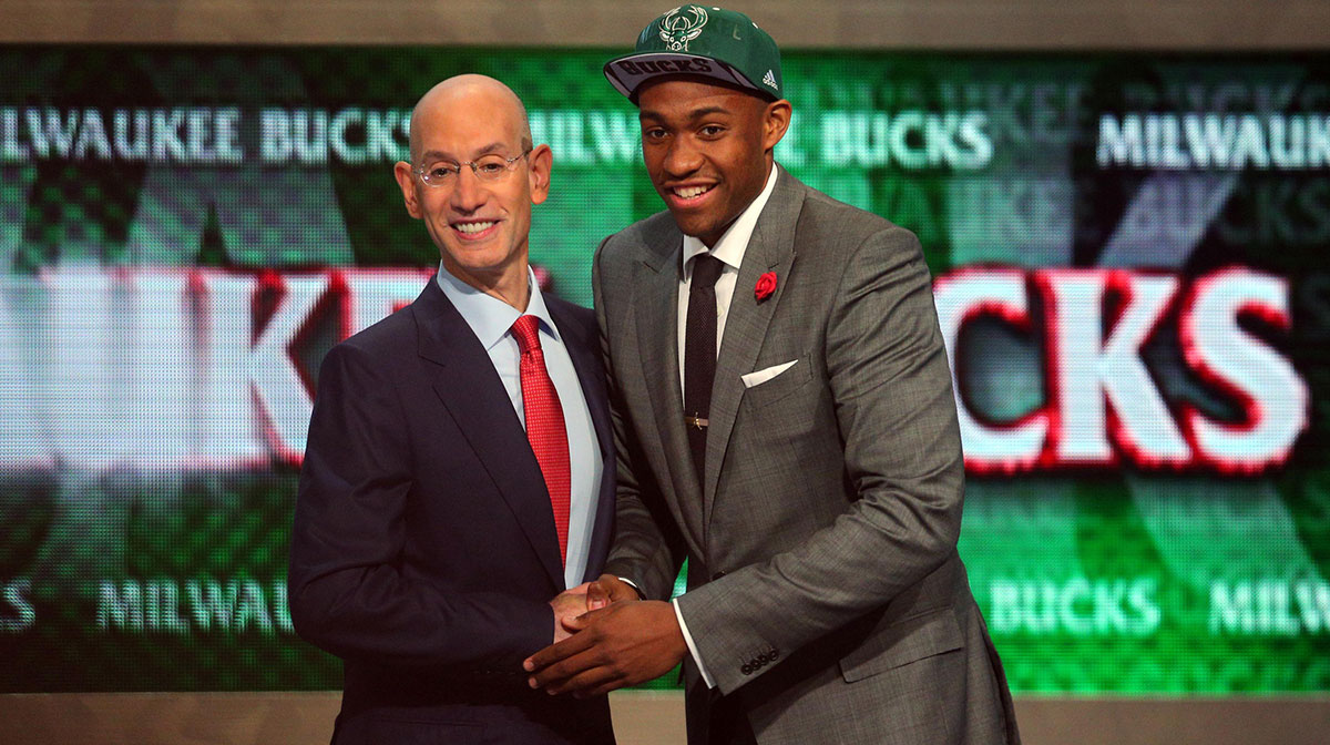 Jabari Parker (Duke) shakes hands with NBA commissioner Adam Silver after being selected as the number two overall pick to the Milwaukee Bucks in the 2014 NBA Draft at the Barclays Center.