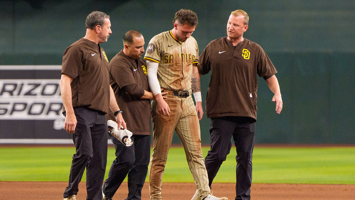 Jun 14, 2025; Phoenix, Arizona, USA; San Diego Padres outfielder Jackson Merrill (3) reacts after getting injured sliding into second base in the seventh inning against the Arizona Diamondbacks at Chase Field.