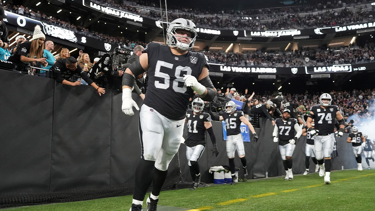 Las Vegas Raiders guard Jackson Powers-Johnson (58) enters the field before the game against the Jacksonville Jaguars.