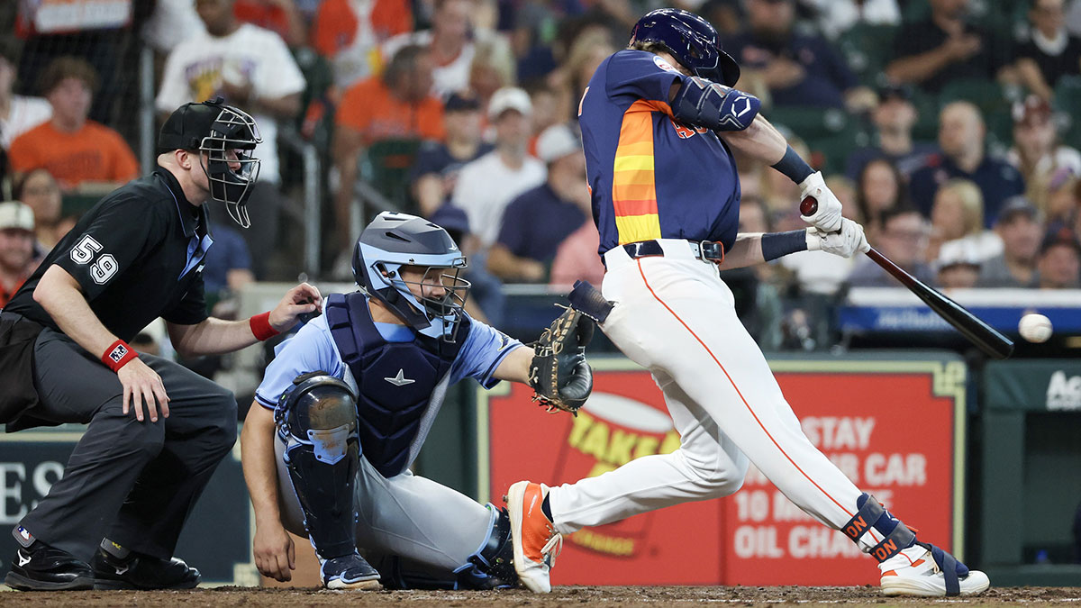 Houston Astros center fielder Jacob Melton (31) hits a single against the Tampa Bay Rays in the fifth inning at Daikin Park.