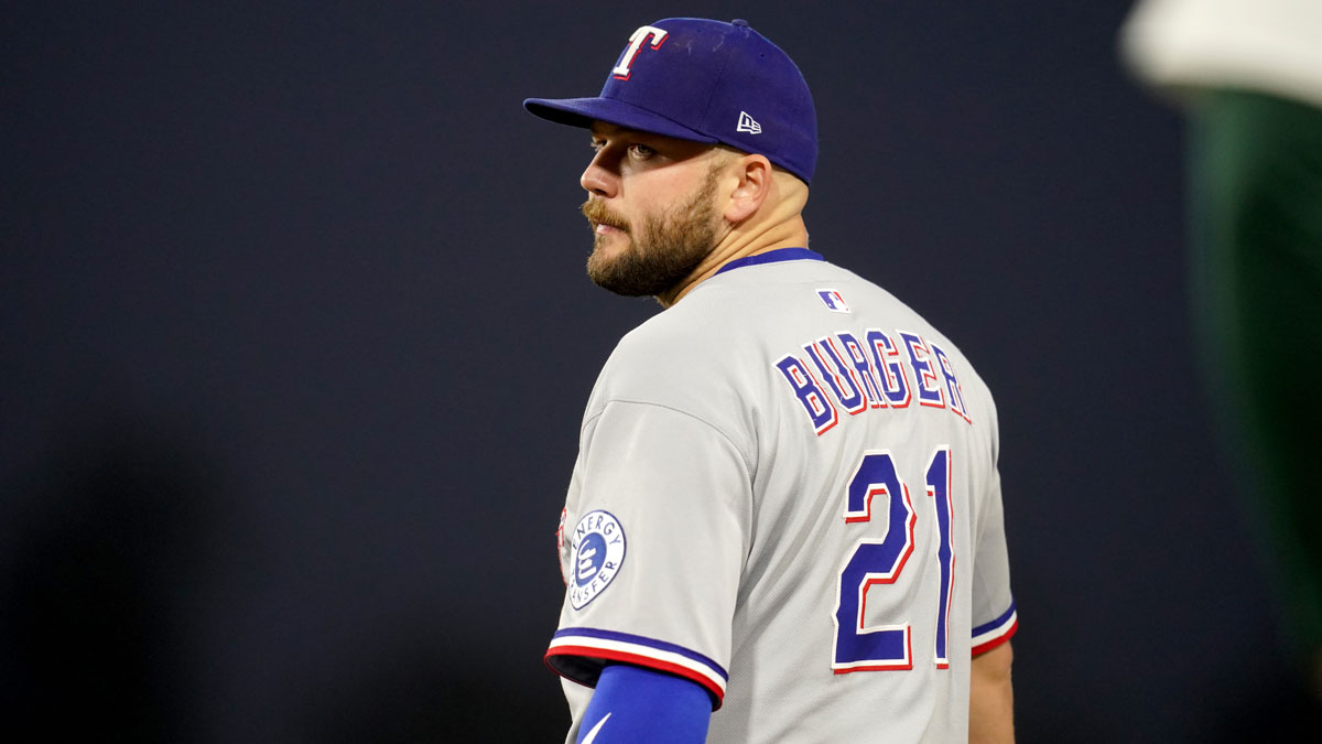 Apr 23, 2025; West Sacramento, California, USA; Texas Rangers first baseman Jake Burger (21) stands on the field during a break in the action against the Athletics in the third inning at Sutter Health Park. Mandatory Credit: Cary Edmondson-Imagn Images
