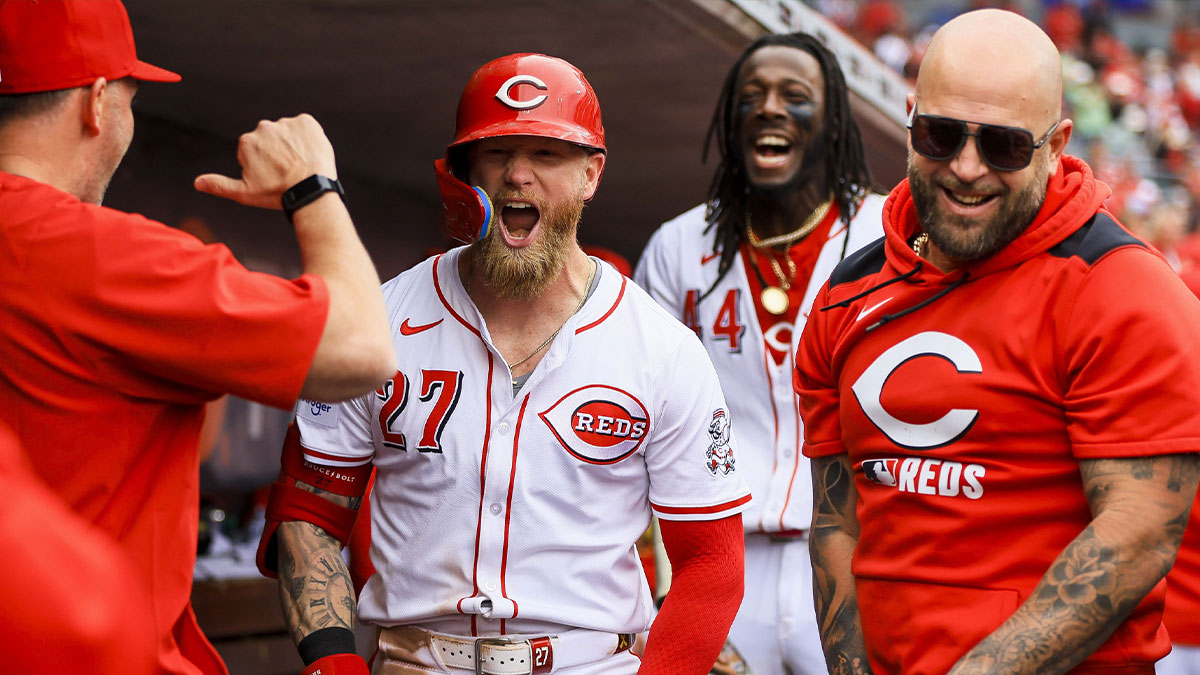 Apr 17, 2025; Cincinnati, Ohio, USA; Cincinnati Reds outfielder Jake Fraley (27) celebrates after hitting a grand slam in the eighth inning against the Seattle Mariners at Great American Ball Park. Mandatory Credit: Katie Stratman-Imagn Images