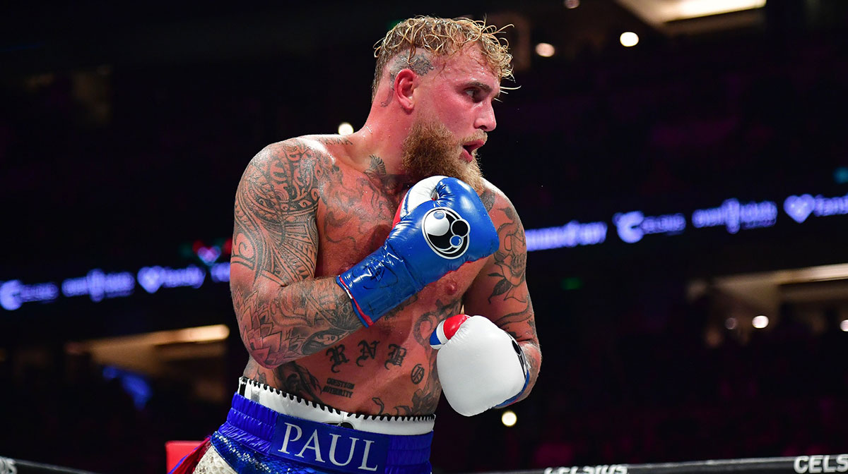 Jun 28, 2025; Anaheim, California, USA; Jake Paul fights against Julio Cesar Chavez Jr. at Honda Center. Mandatory Credit: Gary A. Vasquez-Imagn Images