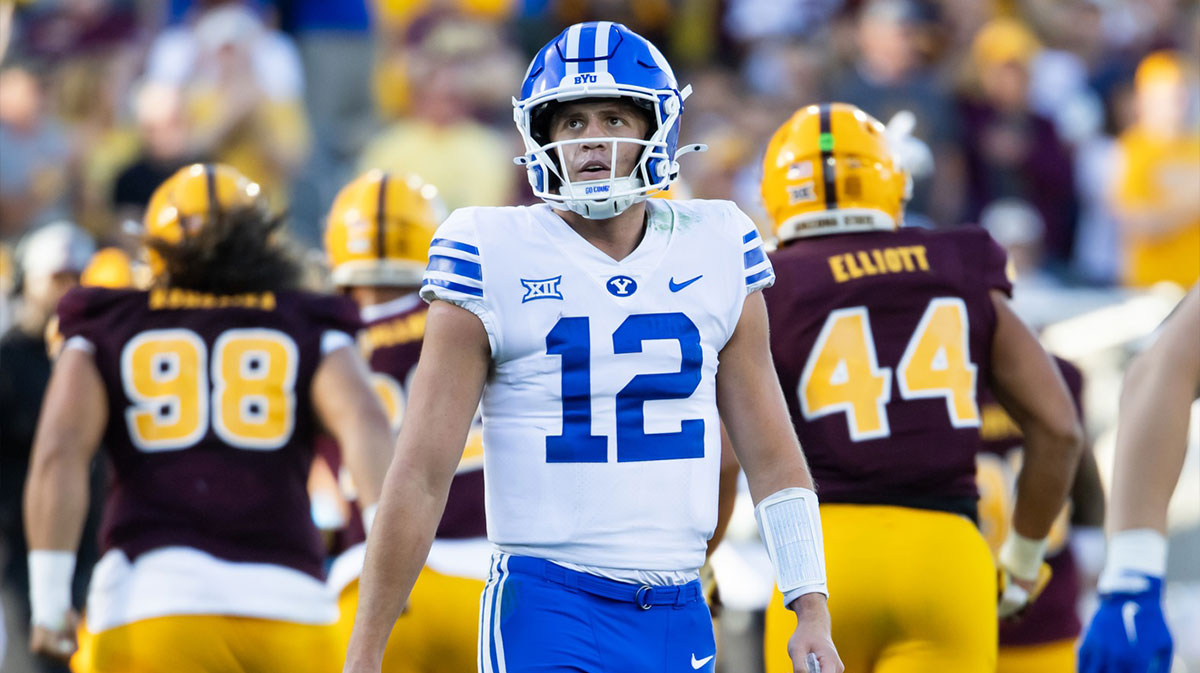 Brigham Young Cougars quarterback Jake Retzlaff (12) reacts against the Arizona State Sun Devils in the second half at Mountain America Stadium.