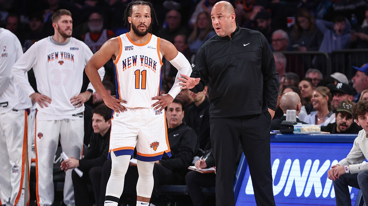 New York Knicks guard Jalen Brunson (11) talks with Assistant Coach Rick Brunson in the third quarter against the New Orleans Pelicans at Madison Square Garden.