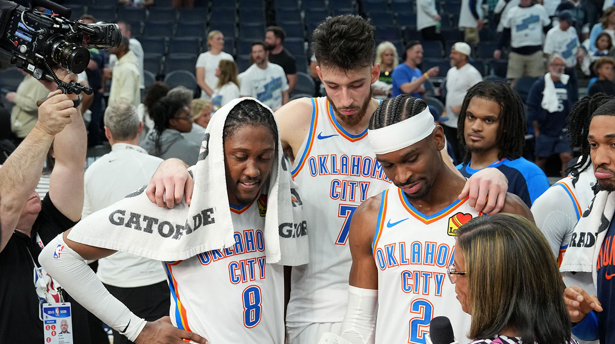Oklahoma City Thunder forward Jalen Williams (8), forward Chet Holmgren (7) and guard Shai Gilgeous-Alexander (2) talk to the media after defeating the Minnesota Timberwolves in game four of the western conference finals for the 2025 NBA Playoffs at Target Center.