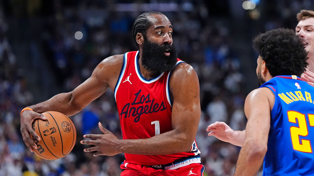 LA Clippers guard James Harden (1) prepares to pass the ball in the second quarter against the Denver Nuggets during game seven of first round for the 2025 NBA Playoffs at Ball Arena.