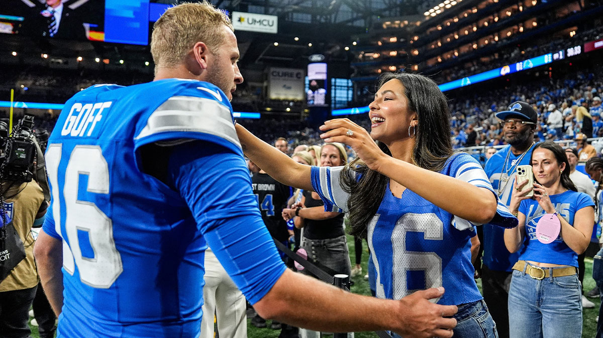 Detroit Lions quarterback Jared Goff hugs his wife Christen Harper during warmups before the Los Angeles Rams game at Ford Field in Detroit on Sunday, Sept. 8, 2024. Junfu Han / USA TODAY NETWORK