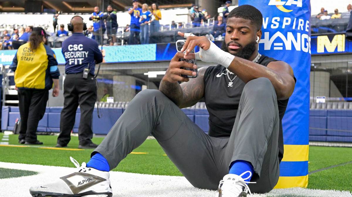Los Angeles Rams linebacker Jared Verse (8) sits on the field prior to the game against the Seattle Seahawks at SoFi Stadium.