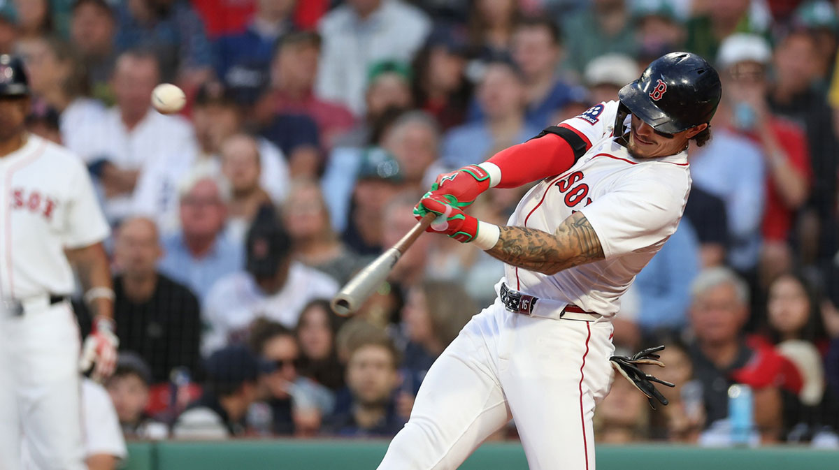 Boston Red Sox left fielder Jarren Duran (16) hits an RBI double during the third inning against the Los Angeles Angels at Fenway Park.