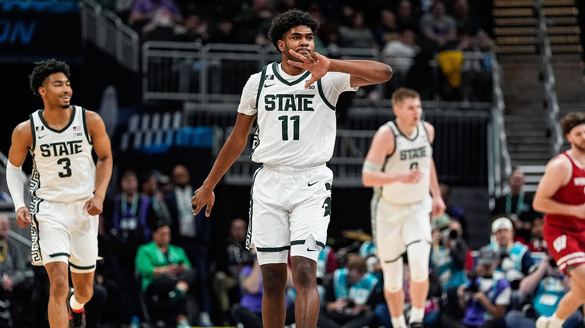 Michigan State guard Jase Richardson celebrates a 3-point basket against Wisconsin during the first half of a Big Ten Tournament semifinal at Gainbridge Fieldhouse in Indianapolis on Saturday, March 15, 2025.